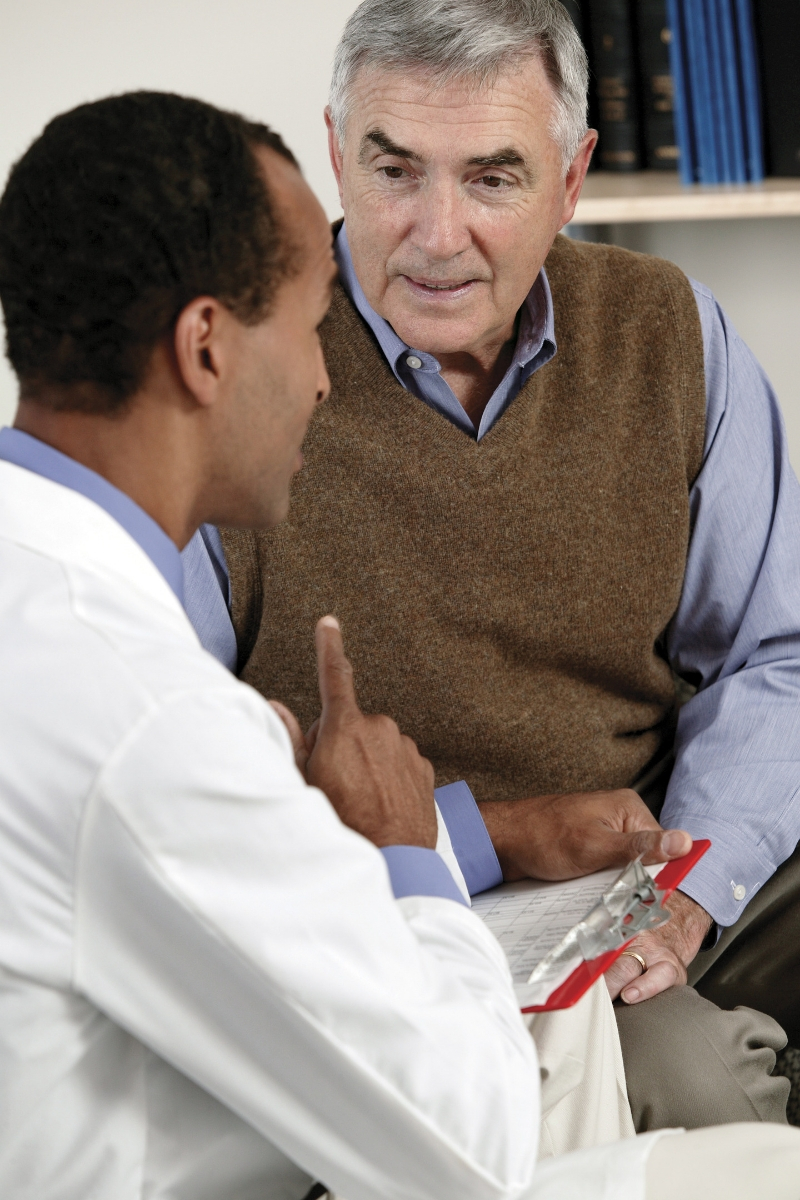doctor consulting a patient about diabetic foot care - MVS Podiatry Associates